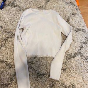 john galt: brandy melville white lettuce edge long sleeve shirt